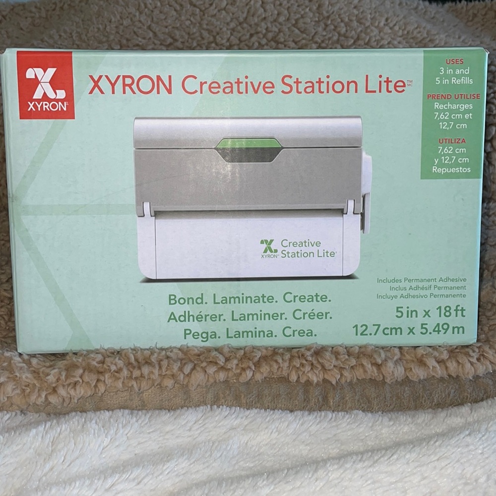 XYRON Creative station Lite plus a extra refill roll
